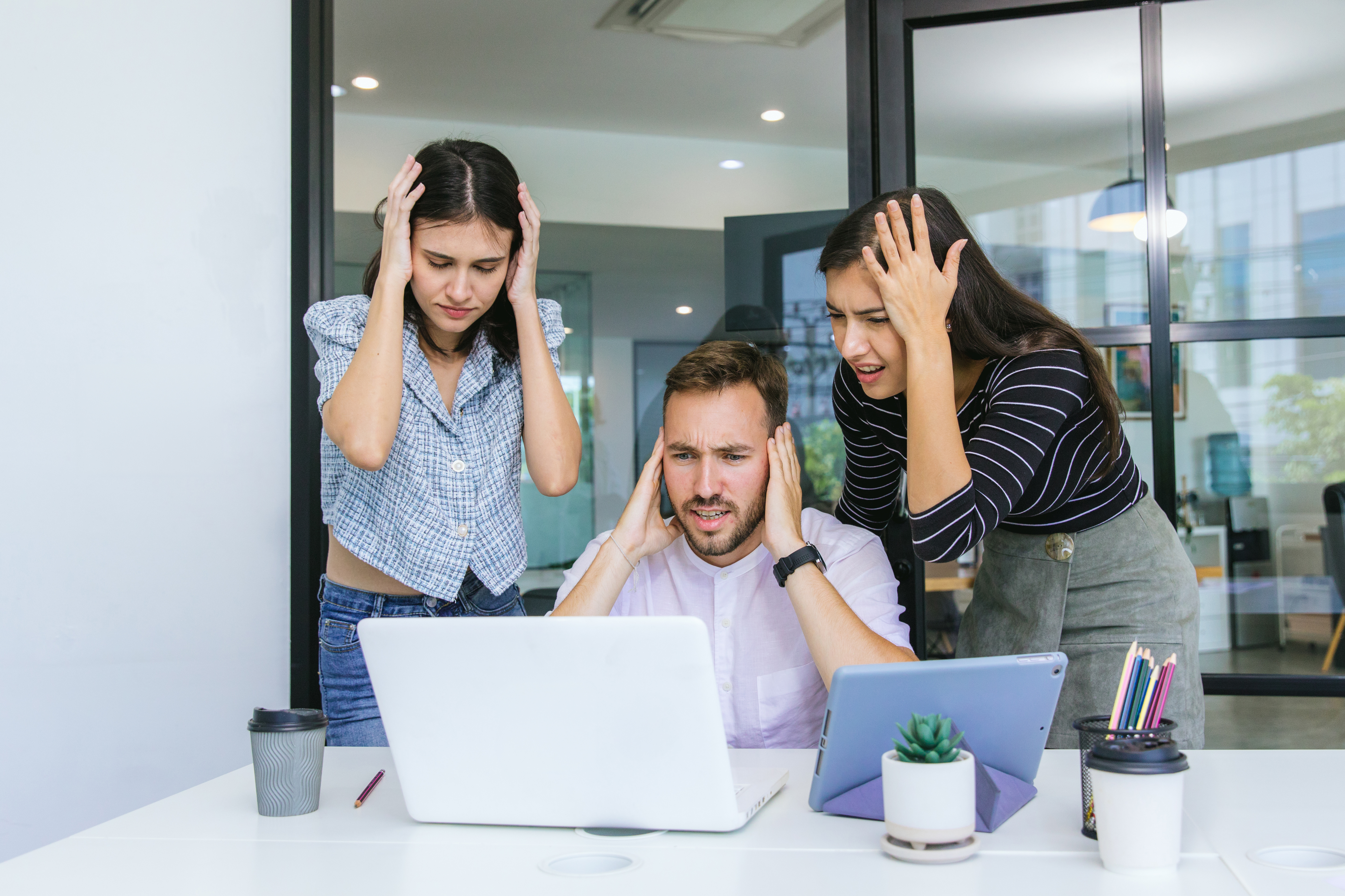 Unwanted metrics appear for marketing team as they watch the computer screen